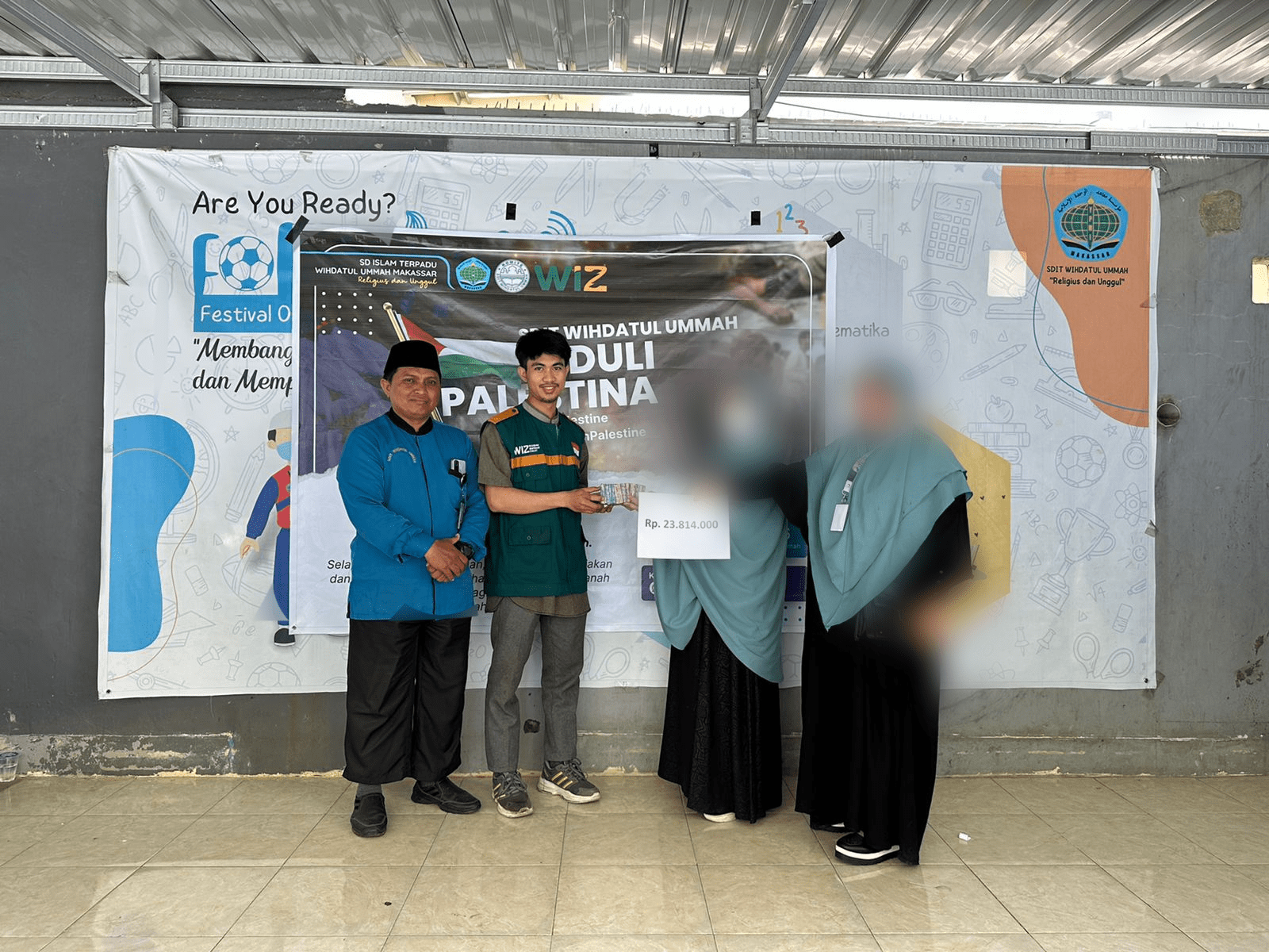 Berbagi dan Peduli Untuk Palestina, SD IT Wihdatul Ummah Makassar menggelar penggalangan donasi bekerja sama dengan Komite Sekolah